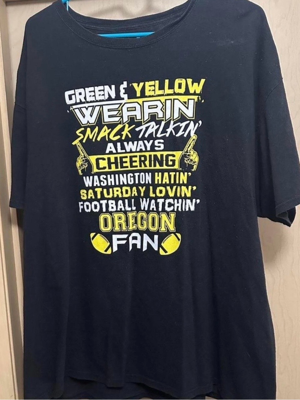 Oregon Fan Black Tee with Yellow & White Football Graphic